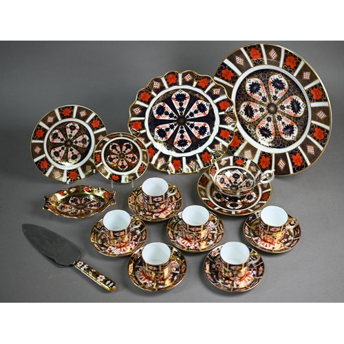 593 - A set of six Royal Crown Derby Imari coffee cans and saucers, 1927, to/w an Imari trio 1976, a 22 cm... 