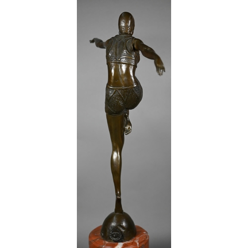 957 - A brown-patinated bronzed figure of an Art Deco dancing girl, after J Philipp, on marble plinth, imp... 