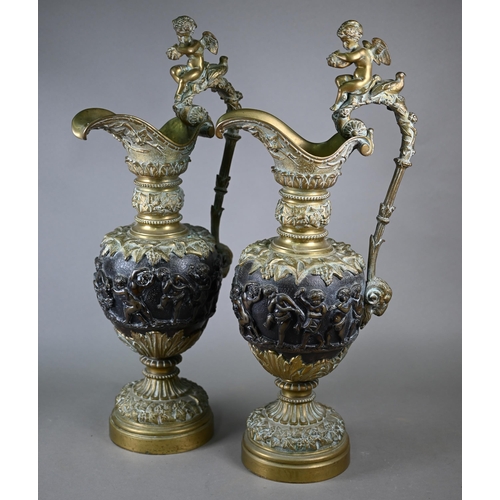 959 - A pair of 19th century Continental brass and bronze garniture ewers in the Renaissance manner, the s... 