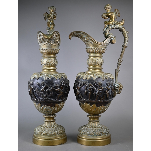 959 - A pair of 19th century Continental brass and bronze garniture ewers in the Renaissance manner, the s... 