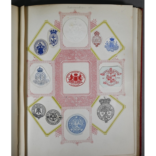 984 - An album of Victorian and later British Empire and foreign postage stamps, to/w an album of crests, ... 