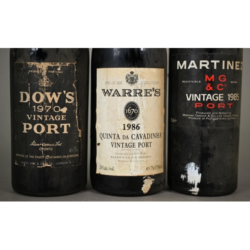 1151 - A bottle of Dows 1970 vintage port, to/w a Martinez MG & Co 1985 vintage port and a Warre's 1986... 