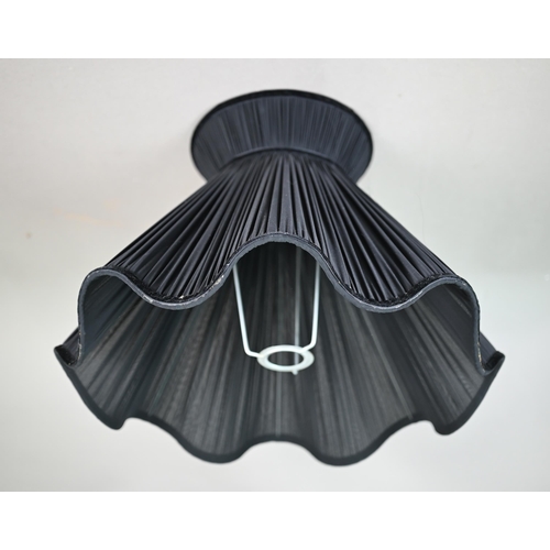 1155 - A Euroluce Collection (Italy) black glass table lamp, 48 cm with pleated shade