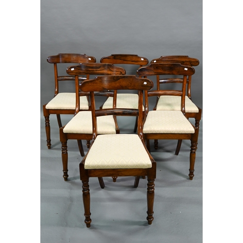 848 - A set of six Victorian hardwood dining side chairs with shaped bar backs over fabric seat pads, rais... 