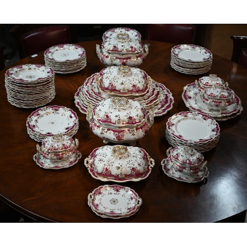 604 - An extensive set of early 19th century china dinnerware (possibly New Hall), decorated with puce, pi... 