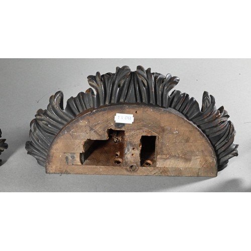 847 - A trio of carved hardwood wall brackets, one large 27 cm high, two 24 cm high, all a/f (3)