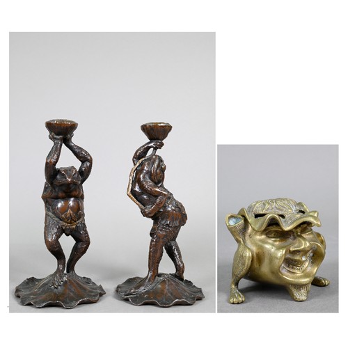 357 - Two 20th century Japanese spelter candlesticks modelled as Kappa, the reptilian kami/yokai from Japa... 