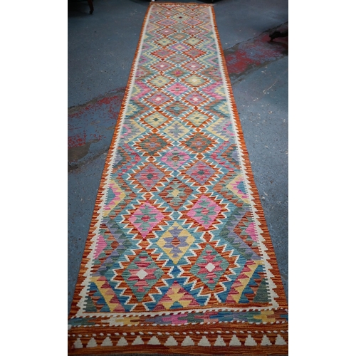 908 - A long Turkish Anatolian kelim runner, 399 x 81 cm