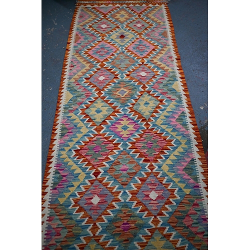 908 - A long Turkish Anatolian kelim runner, 399 x 81 cm