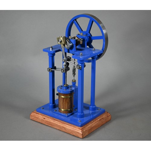 1180 - A model Stirling engine with 14 cm flywheel, 30 cm high