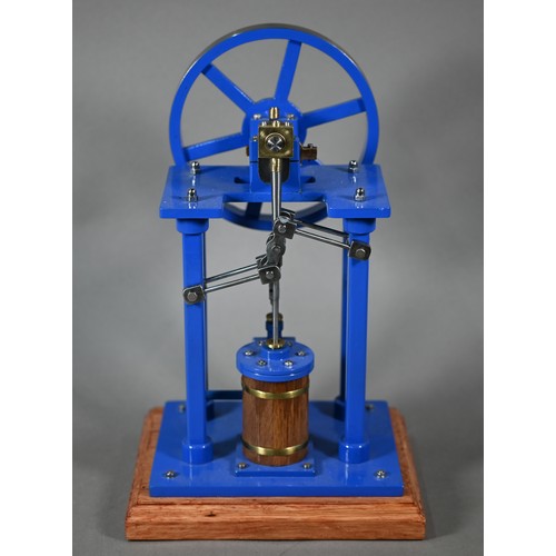 1180 - A model Stirling engine with 14 cm flywheel, 30 cm high