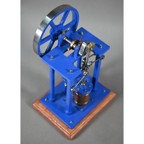 1180 - A model Stirling engine with 14 cm flywheel, 30 cm high