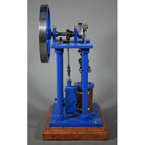 1180 - A model Stirling engine with 14 cm flywheel, 30 cm high