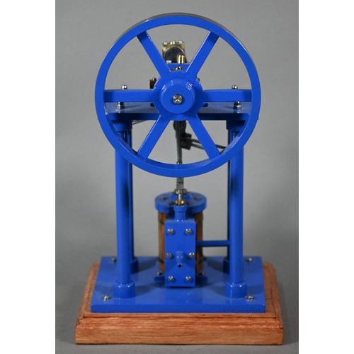 1180 - A model Stirling engine with 14 cm flywheel, 30 cm high