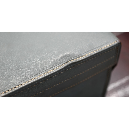 136 - A vintage grey leather dressing-case by Finnigan's of Bond Street, the watered grey satin lining wit... 