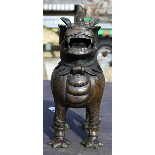 363 - A Chinese bronze Luduan-form mythical beast censer in the Yuan/Ming dynasty manner, cast standing fo... 