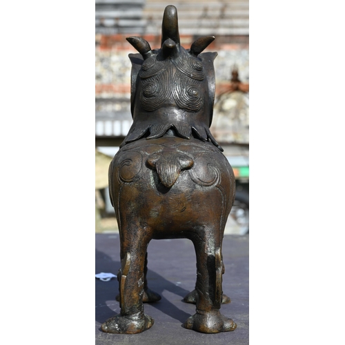 363 - A Chinese bronze Luduan-form mythical beast censer in the Yuan/Ming dynasty manner, cast standing fo... 