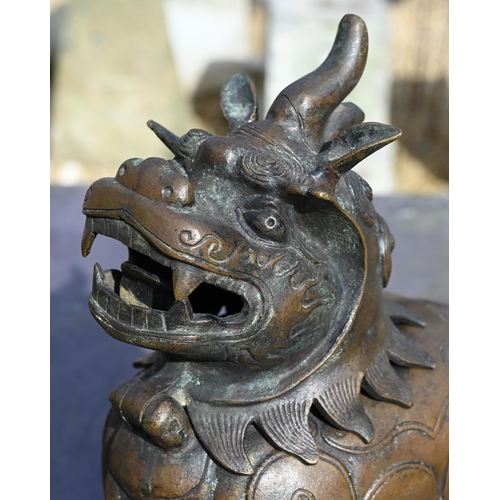 363 - A Chinese bronze Luduan-form mythical beast censer in the Yuan/Ming dynasty manner, cast standing fo... 