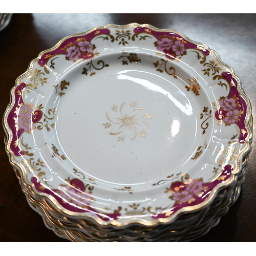 604 - An extensive set of early 19th century china dinnerware (possibly New Hall), decorated with puce, pi... 