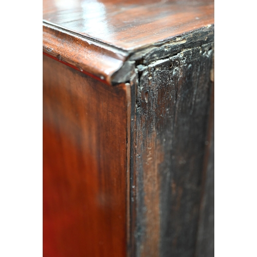 884 - An 18th century mahogany chest with a full width slide over four long graduated drawers, each with (... 