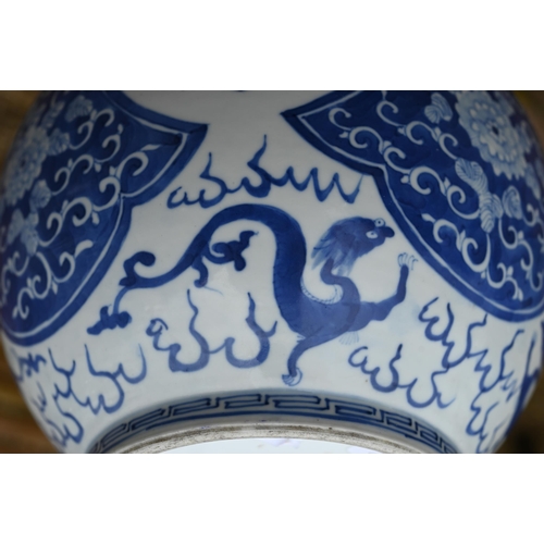 334 - A late 19th century Chinese blue and white vase, the flared neck painted with diaper, ruyi-head and ... 