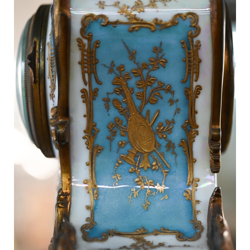 776 - A French gilt metal mounted enamel panelled glazed porcelain rococo style clock, the twin drum 8-day... 