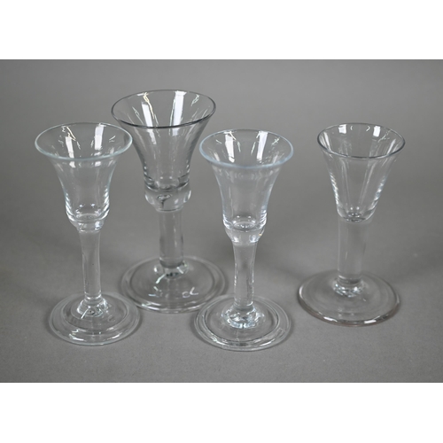 450 - A Georgian drinking glass with bell bowl, with bubble to base, plain stem and domed foot with folded... 