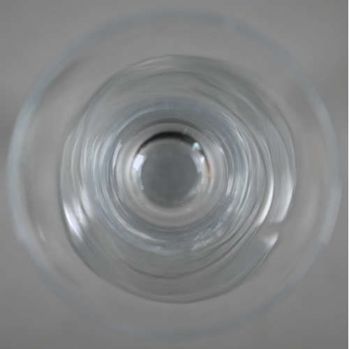 450 - A Georgian drinking glass with bell bowl, with bubble to base, plain stem and domed foot with folded... 