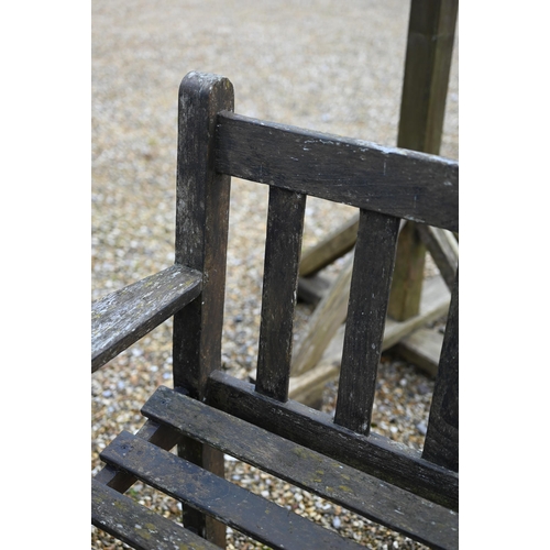 100 - A weathered teak garden bench