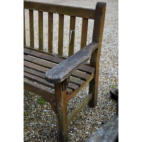 101 - A weathered teak garden bench