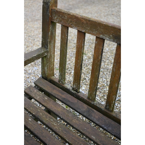 101 - A weathered teak garden bench