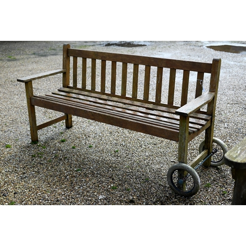 102 - A weathered teak garden bench