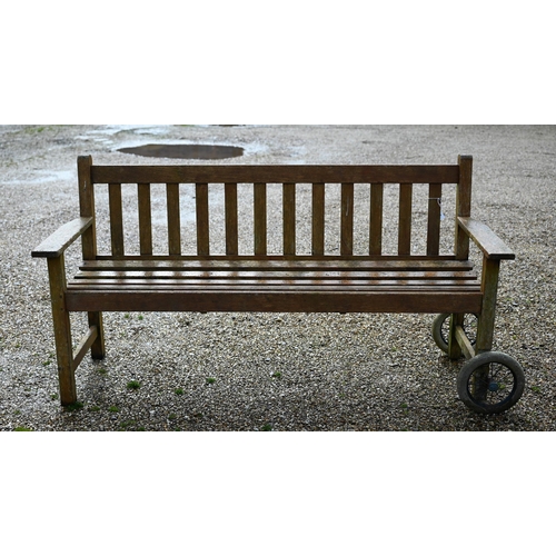 102 - A weathered teak garden bench