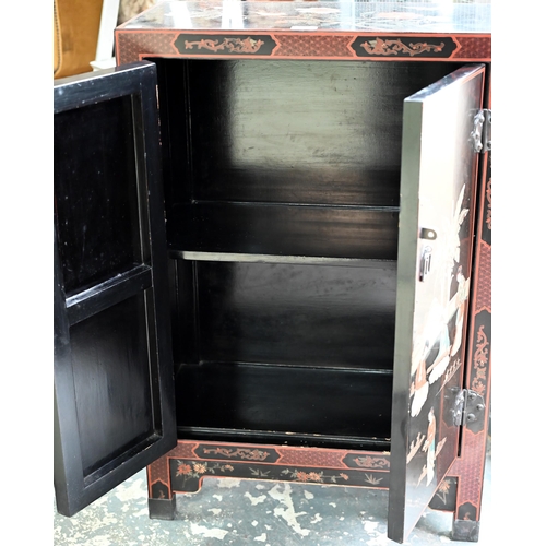 118 - A Japanese black lacquered and polychrome pictorial decorated cabinet, 62 cm x 31 cm x 92 cm h, lock... 