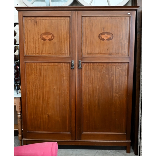 129 - 'Sopwith & Co Newcastle upon Tyne' Sheraton revival compactum wardrobe with twin-panelled doors ... 