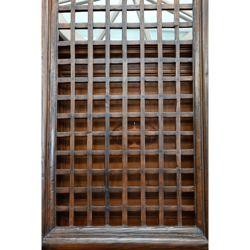 131 - A large stained hardwood four-panel screen 210 x 65 cm (each panel)