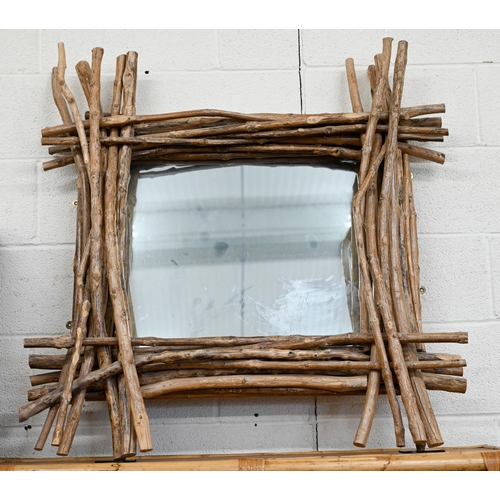 133 - A wall mirror in layered driftwood frame, 100 x 100 cm