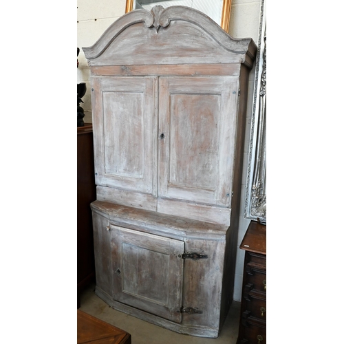 139 - A Continental antique lime washed dresser/kitchen cabinet with panelled doors, 108 cm wide x 44 cm d... 