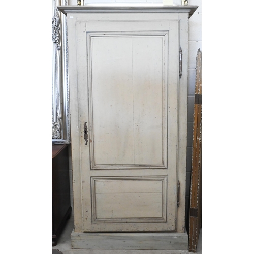 142 - A Continental antique painted pine pantry cupboard with full length panelled door enclosing shelved ... 