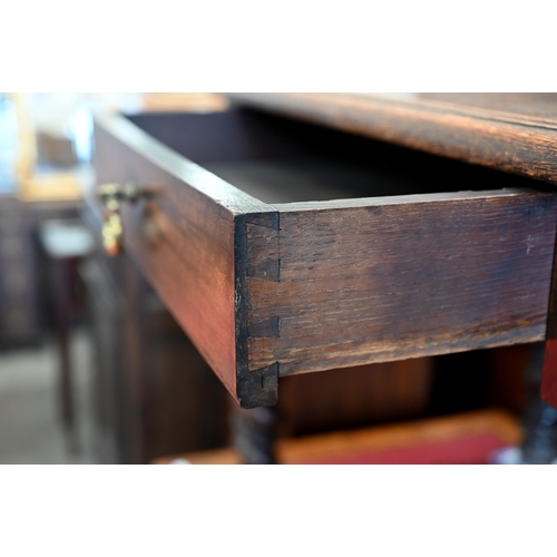 146 - An antique oak side table with frieze drawer and barleytwist supports, 78 x 54 x 58 cm high