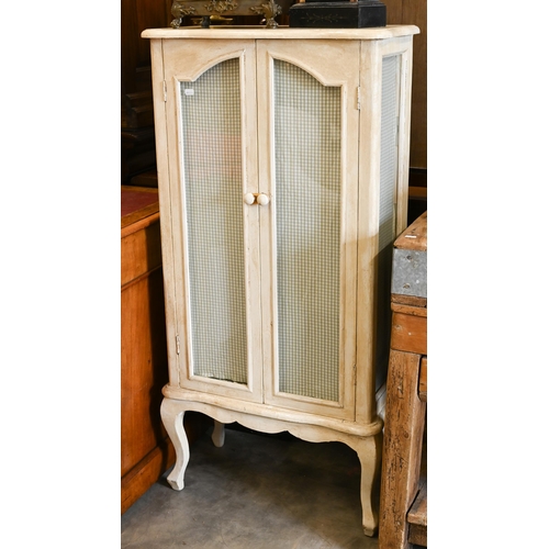 148 - A French cream painted cabinet with glazed doors and side panels, shelved interior, cabriole support... 