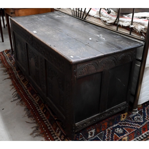 159 - A large 18th century carved oak coffer/blanket chest (a/f), 132 cm wide x 60 cm deep x 62 cm high