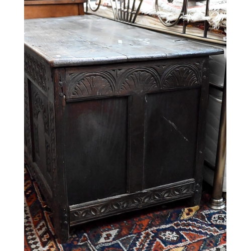 159 - A large 18th century carved oak coffer/blanket chest (a/f), 132 cm wide x 60 cm deep x 62 cm high