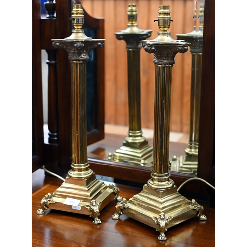 170 - A pair of modern brass classical column table lamps, 52 cm high (2)