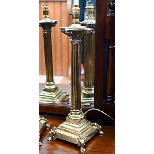 170 - A pair of modern brass classical column table lamps, 52 cm high (2)