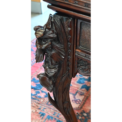 175 - A floral and foliate carved hardwood side table with frieze drawer and cabriole supports, 75 x 65 x ... 