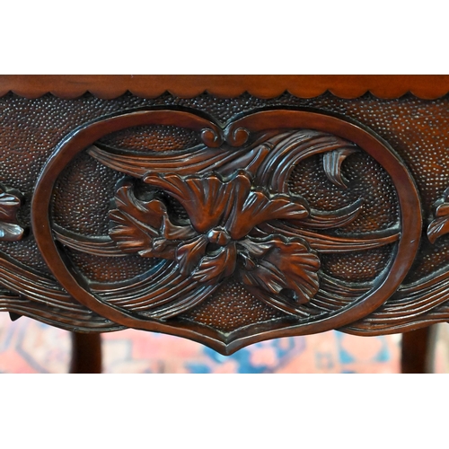 175 - A floral and foliate carved hardwood side table with frieze drawer and cabriole supports, 75 x 65 x ... 