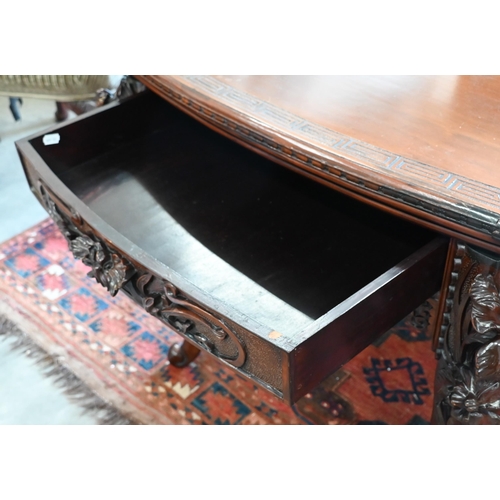 175 - A floral and foliate carved hardwood side table with frieze drawer and cabriole supports, 75 x 65 x ... 