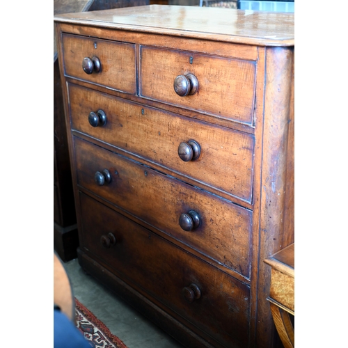 179 - A 19th century mahogany chest of two short over three long drawers with turned handles, 106 cm wide ... 