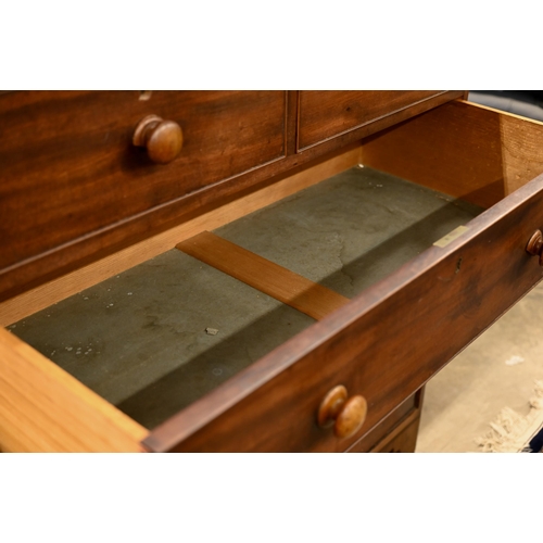 184 - A large 19th century mahogany chest of two short over three long drawers on splayed bracket feet, 10... 